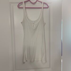 SKIMS Sheer Cotton Blend Mini Slip Dress in white.
